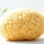 Using a raw loofah sponge for exfoliating natural skincare