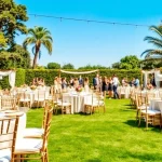Experience stunning Event Rentals with beautifully arranged tables and chairs for outdoor celebrations.